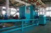 Automated valve test bench with conveyor belt