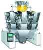 Automatic weighing machine for dry products