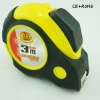 Co-molded tape measure