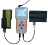External laptop battery tester connecting two batteries, battery tester, detector