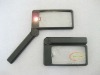 Folding lighted magnifying galss
