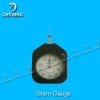 Gram gauge