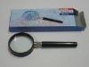 Hand-held magnifying glass