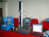 Material tensile strength tester with extensometer