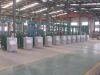 Steel cylinder pressure test loader-unloader