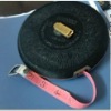 fibre tape measure with plastic skin