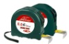 green steel measuring tape