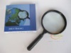 handheld magnifying glass